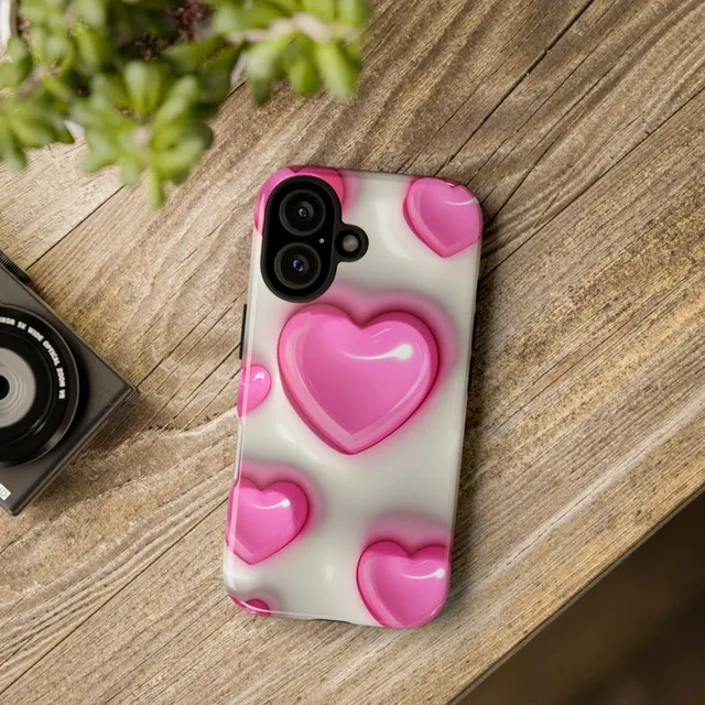 Handyhülle „Rosa 3D-Herzen“: Hülle mit glänzenden pinken 3D-Herzen